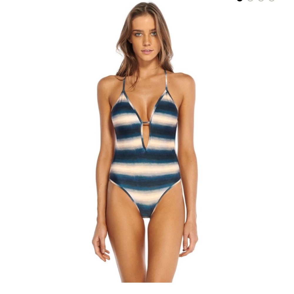 New this season, one piece, very flattering suit